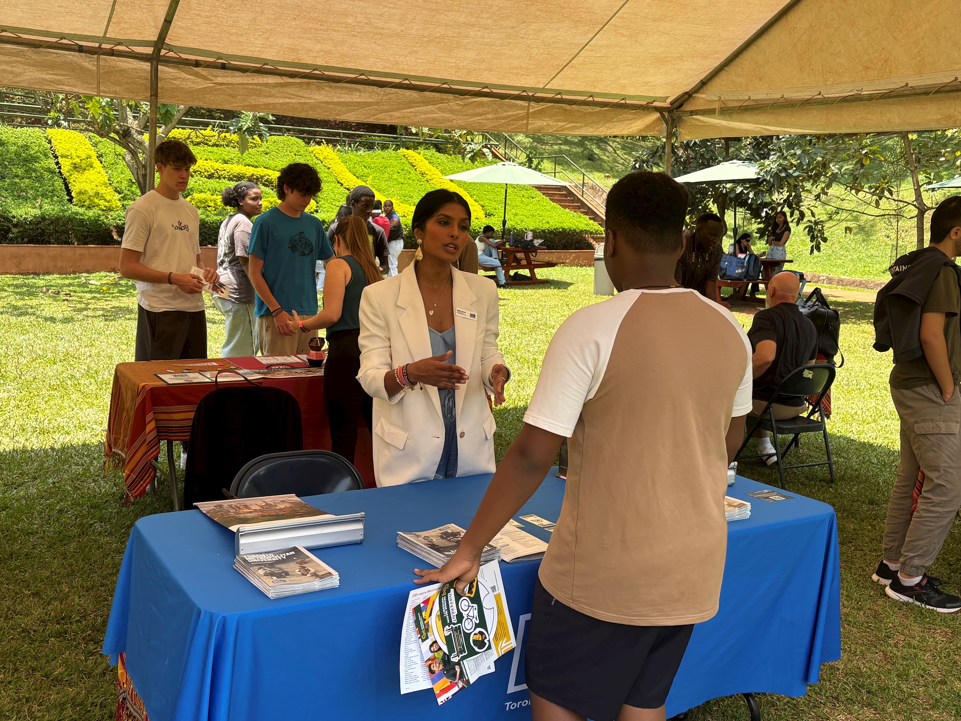 student and a college representative during a fair